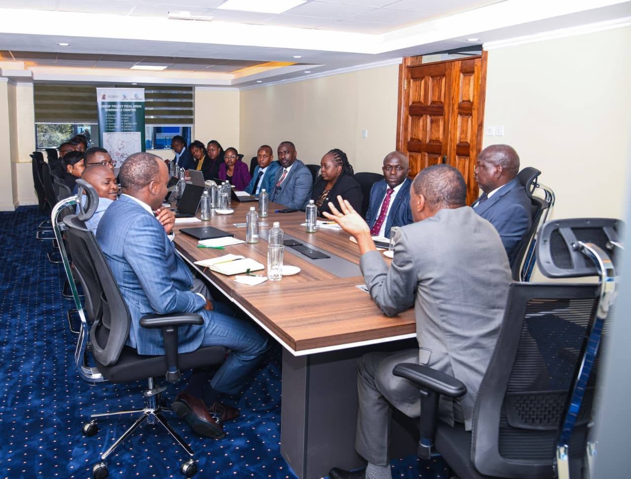 Forestry Principal Secretary Mr. Gitonga Mugambi during his inaugural meeting with KEWASIP-NPCU officers at their new offices in Blue Shield, Upper Hill, Nairobi.